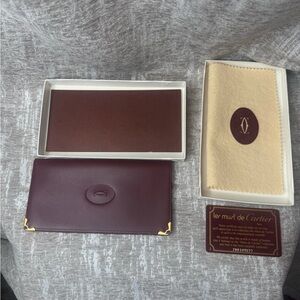 NWT Cartier Must Line Leather Long Wallet New/dust cloth/box and COA